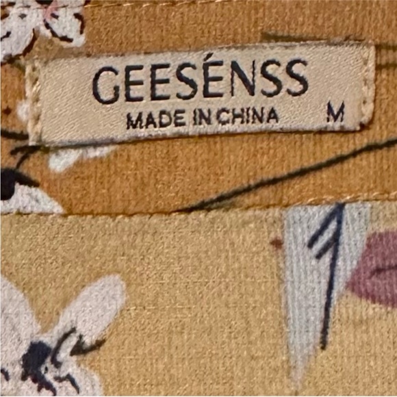 Women's Floral Chiffon Blouse 3/4 Sleeve V
Neck Yellow Zipper Top - Picture 5 of 6